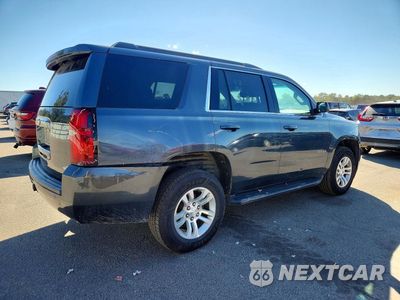 Trzecie zdjęcie samochodu z tyłu: 2019 CHEVROLET TAHOE K1500 LT VIN:1GNSKBKC8KR136663 - miniatura