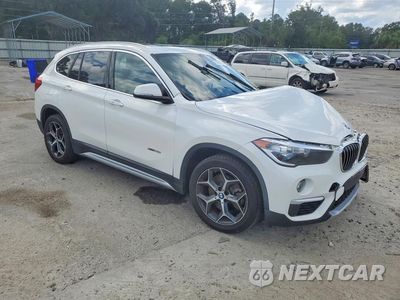 Czwarte zdjęcie samochodu z boku: 2018 BMW X1 XDRIVE28I VIN:WBXHT3C35J5L25414 - miniatura