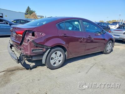 Trzecie zdjęcie samochodu z tyłu: 2018 KIA FORTE LX VIN:3KPFK4A7XJE254931 - miniatura