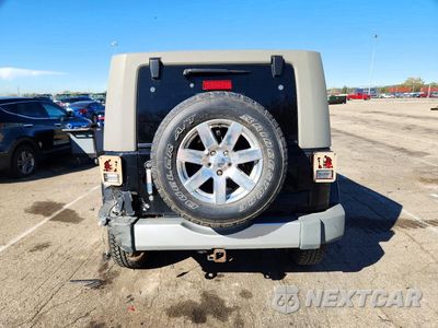 Zdjęcie 6 z 13 samochodu: 2009 JEEP WRANGLER UNLIMITED SAHARA VIN:1J4GA59169L721157 - miniatura