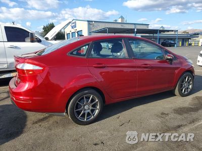Trzecie zdjęcie samochodu z tyłu: 2015 FORD FIESTA SE VIN:3FADP4BE2FM176380 - miniatura