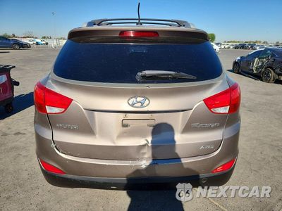 Zdjęcie 6 z 12 samochodu: 2013 HYUNDAI TUCSON GLS VIN:KM8JUCAC2DU623763 - miniatura