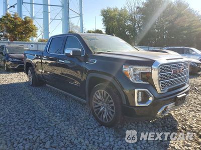 Czwarte zdjęcie samochodu z boku: 2019 GMC SIERRA K1500 DENALI VIN:1GTU9FELXKZ213694 - miniatura