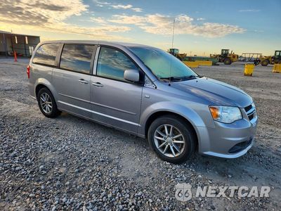 Czwarte zdjęcie samochodu z boku: 2014 DODGE GRAND CARAVAN SE VIN:2C4RDGBG2ER223331 - miniatura