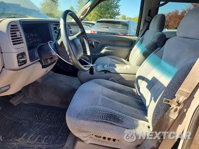 Zdjęcie 7 z 12 samochodu: 1999 CHEVROLET TAHOE K1500 VIN:1GNEK13R9XJ504722 - miniatura