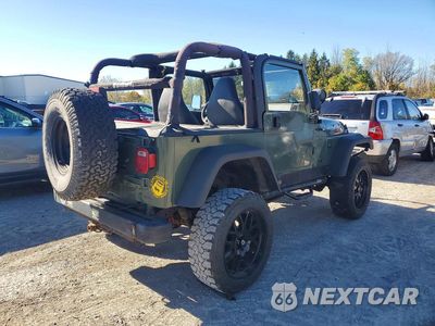 Trzecie zdjęcie samochodu z tyłu: 1999 JEEP WRANGLER / TJ SPORT VIN:1J4FY19S1XP460132 - miniatura