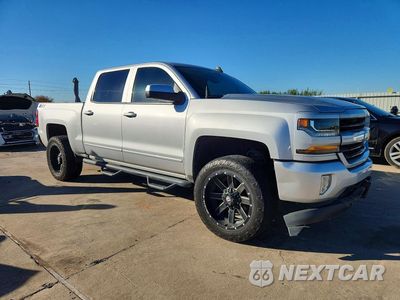 Czwarte zdjęcie samochodu z boku: 2018 CHEVROLET SILVERADO K1500 LT VIN:3GCUKREC3JG569716 - miniatura