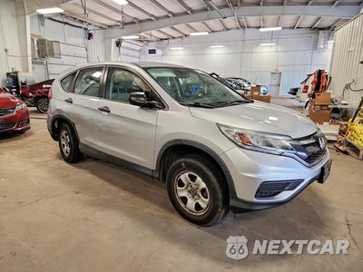 Czwarte zdjęcie samochodu z boku: 2016 HONDA CR-V LX VIN:5J6RM4H38GL114008 - miniatura