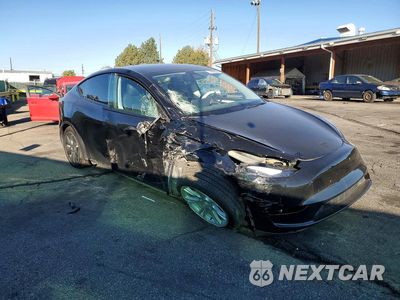 Czwarte zdjęcie samochodu z boku: 2023 TESLA MODEL Y VIN:7SAYGDEE4PF877924 - miniatura
