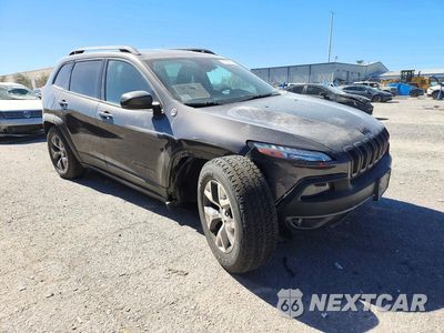 Czwarte zdjęcie samochodu z boku: 2014 JEEP CHEROKEE TRAILHAWK VIN:1C4PJMBS2EW255934 - miniatura