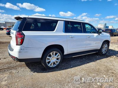 Trzecie zdjęcie samochodu z tyłu: 2021 CHEVROLET SUBURBAN K1500 HIGH COUNTRY VIN:1GNSKGKL8MR416616 - miniatura