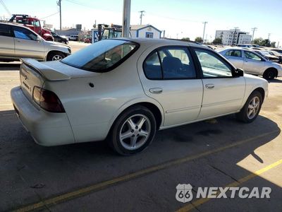 Trzecie zdjęcie samochodu z tyłu: 1999 NISSAN MAXIMA GXE VIN:JN1CA21D2XT204284 - miniatura