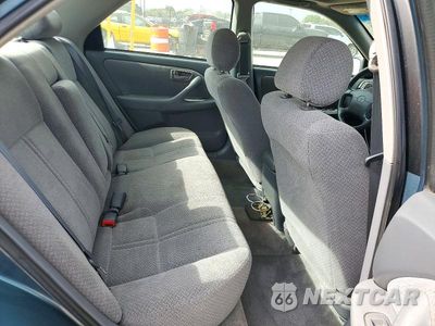 Zdjęcie 10 z 12 samochodu: 2001 TOYOTA CAMRY LE VIN:4T1BG22K01U831566 - miniatura