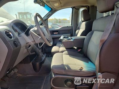 Zdjęcie 7 z 12 samochodu: 2004 FORD F150 VIN:1FTRF14534NB10521 - miniatura