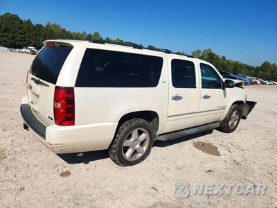 Trzecie zdjęcie samochodu z tyłu: 2012 CHEVROLET SUBURBAN K1500 LTZ VIN:1GNSKKE74CR182183 - miniatura