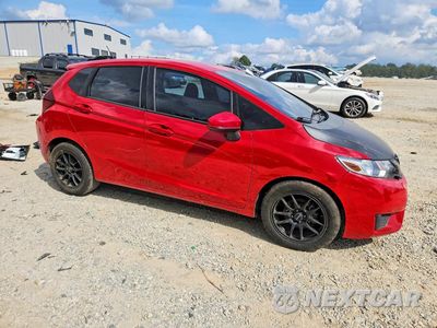 Czwarte zdjęcie samochodu z boku: 2015 HONDA FIT LX VIN:3HGGK5G57FM767701 - miniatura