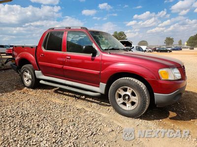 Czwarte zdjęcie samochodu z boku: 2004 FORD EXPLORER SPORT TRAC VIN:1FMZU67K34UA28357 - miniatura