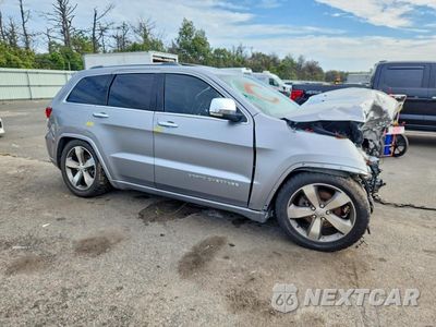 Czwarte zdjęcie samochodu z boku: 2015 JEEP GRAND CHEROKEE OVERLAND VIN:1C4RJFCG3FC238089 - miniatura