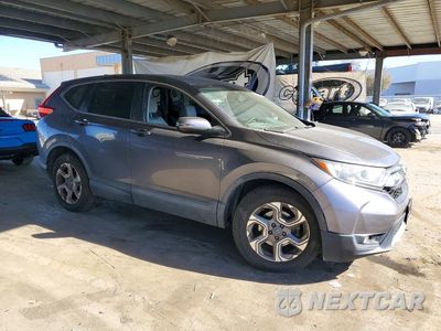 Czwarte zdjęcie samochodu z boku: 2017 HONDA CR-V EXL VIN:2HKRW2H80HH611267 - miniatura