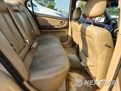 Zdjęcie 10 z 12 samochodu: 2000 NISSAN MAXIMA GXE VIN:JN1CA31A0YT004291 - miniatura
