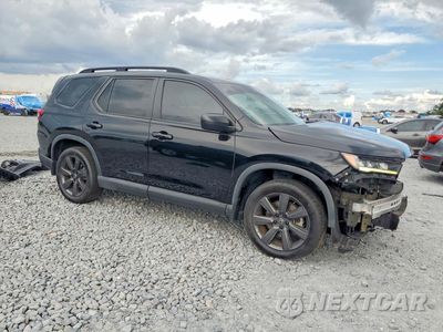 Czwarte zdjęcie samochodu z boku: 2023 HONDA PILOT SPORT VIN:5FNYG2H30PB003923 - miniatura