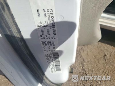Zdjęcie 13 z 13 samochodu: 2014 DODGE GRAND CARAVAN SE VIN:2C4RDGBG3ER417236 - miniatura