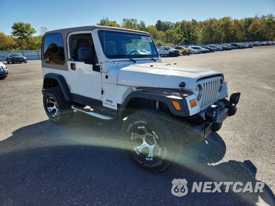 Czwarte zdjęcie samochodu z boku: 2004 JEEP WRANGLER / TJ SE VIN:1J4FA29114P722583 - miniatura