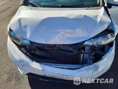 Zdjęcie 11 z 12 samochodu: 2016 HONDA FIT LX VIN:JHMGK5H58GX024312 - miniatura