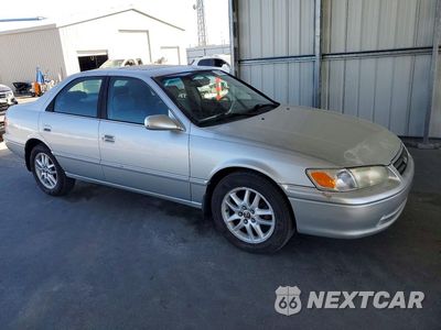 Czwarte zdjęcie samochodu z boku: 2001 TOYOTA CAMRY XLE V6 VIN:4T1BF28K11U960443 - miniatura
