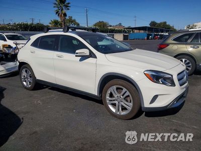 Czwarte zdjęcie samochodu z boku: 2015 MERCEDES-BENZ GLA 250 VIN:WDCTG4EB7FJ164515 - miniatura