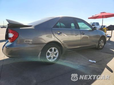 Trzecie zdjęcie samochodu z tyłu: 2003 TOYOTA CAMRY LE VIN:4T1BE32K33U718712 - miniatura