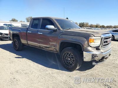 Czwarte zdjęcie samochodu z boku: 2015 GMC SIERRA C1500 SLT VIN:1GTR1VEC4FZ192936 - miniatura