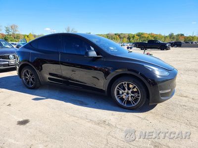 Czwarte zdjęcie samochodu z boku: 2024 TESLA MODEL Y VIN:7SAYGDEE0RA330553 - miniatura