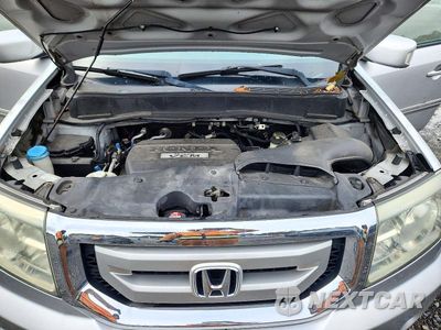 Zdjęcie 12 z 13 samochodu: 2010 HONDA PILOT TOURING VIN:5FNYF4H91AB024547 - miniatura
