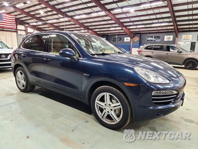 Czwarte zdjęcie samochodu z boku: 2014 PORSCHE CAYENNE S HYBRID VIN:WP1AE2A2XELA51236 - miniatura