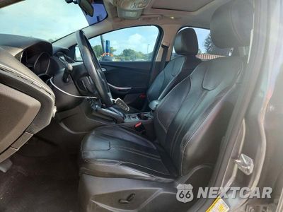 Zdjęcie 7 z 13 samochodu: 2013 FORD FOCUS TITANIUM VIN:1FADP3J24DL383692 - miniatura