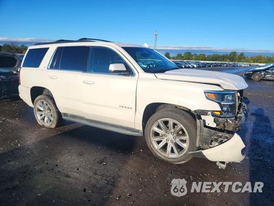 Czwarte zdjęcie samochodu z boku: 2019 CHEVROLET TAHOE K1500 LT VIN:1GNSKBKC5KR184122 - miniatura