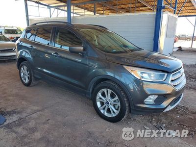 Czwarte zdjęcie samochodu z boku: 2018 FORD ESCAPE SE VIN:1FMCU0GD1JUC70855 - miniatura