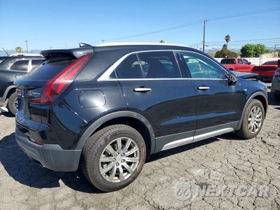 Trzecie zdjęcie samochodu z tyłu: 2019 CADILLAC XT4 PREMIUM LUXURY VIN:1GYFZCR41KF155206 - miniatura