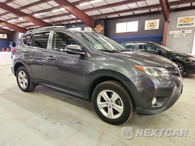 Czwarte zdjęcie samochodu z boku: 2013 TOYOTA RAV4 XLE VIN:JTMRFREV8DD014127 - miniatura