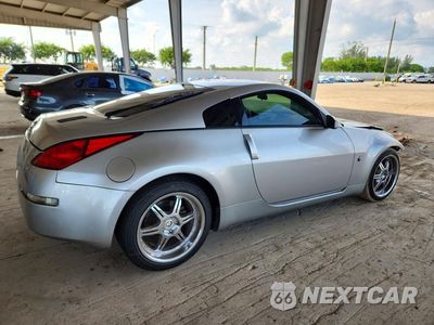 Trzecie zdjęcie samochodu z tyłu: 2003 NISSAN 350Z COUPE VIN:JN1AZ34D53T110461 - miniatura