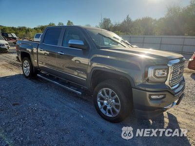 Czwarte zdjęcie samochodu z boku: 2017 GMC SIERRA K1500 DENALI VIN:3GTU2PEJ4HG194254 - miniatura