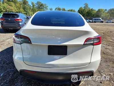 Zdjęcie 6 z 13 samochodu: 2022 TESLA MODEL Y VIN:7SAYGDEE0NF374968 - miniatura