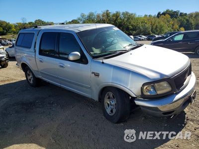 Czwarte zdjęcie samochodu z boku: 2001 FORD F150 SUPERCREW VIN:1FTRW08L51KE21433 - miniatura
