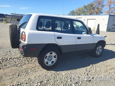Trzecie zdjęcie samochodu z tyłu: 1999 TOYOTA RAV4 BASE VIN:JT3GP10V8X0035847 - miniatura