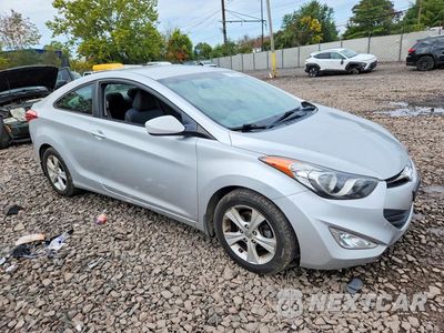 Czwarte zdjęcie samochodu z boku: 2013 HYUNDAI ELANTRA COUPE GS VIN:KMHDH6AE4DU013335 - miniatura