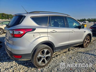 Trzecie zdjęcie samochodu z tyłu: 2017 FORD ESCAPE SE VIN:1FMCU0G95HUB64804 - miniatura