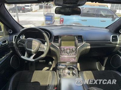 Zdjęcie 9 z 13 samochodu: 2014 JEEP GRAND CHEROKEE SRT-8 VIN:1C4RJFDJ9EC555495 - miniatura