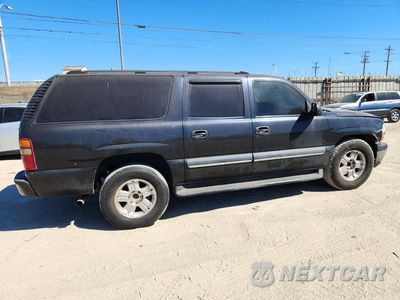 Trzecie zdjęcie samochodu z tyłu: 2003 CHEVROLET SUBURBAN C1500 VIN:1GNEC16T43J192615 - miniatura