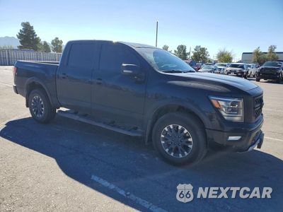 Czwarte zdjęcie samochodu z boku: 2024 NISSAN TITAN PRO-4X VIN:1N6AA1ED3RN100450 - miniatura